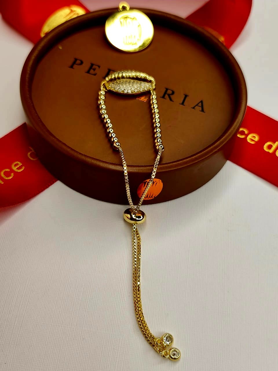 Bracelet ajustable en cauris strass image
